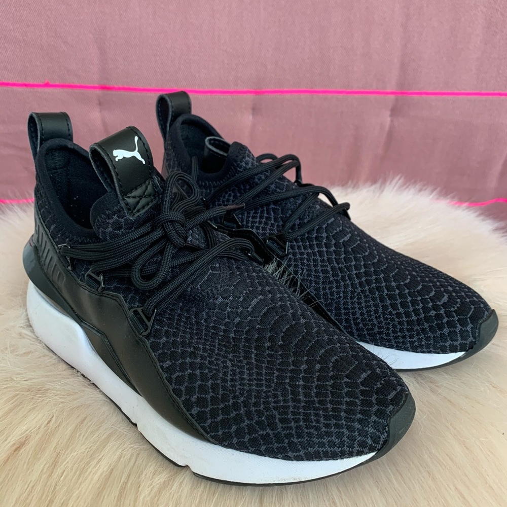 Black Puma sneakers